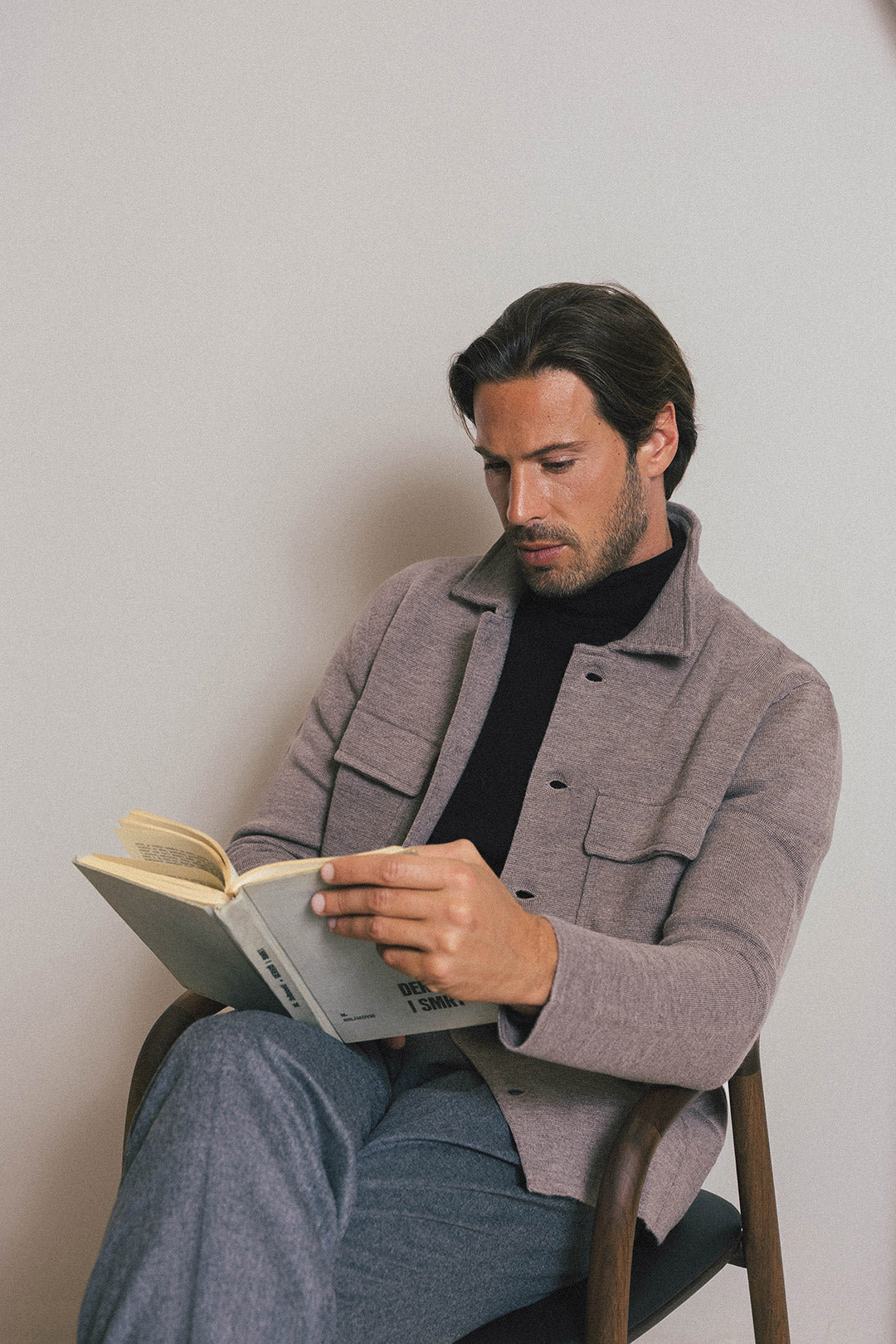 Black Extra‐fine Merino Turtleneck Sweater